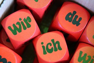 Würfel mit Aufdruck: wir, ich, du